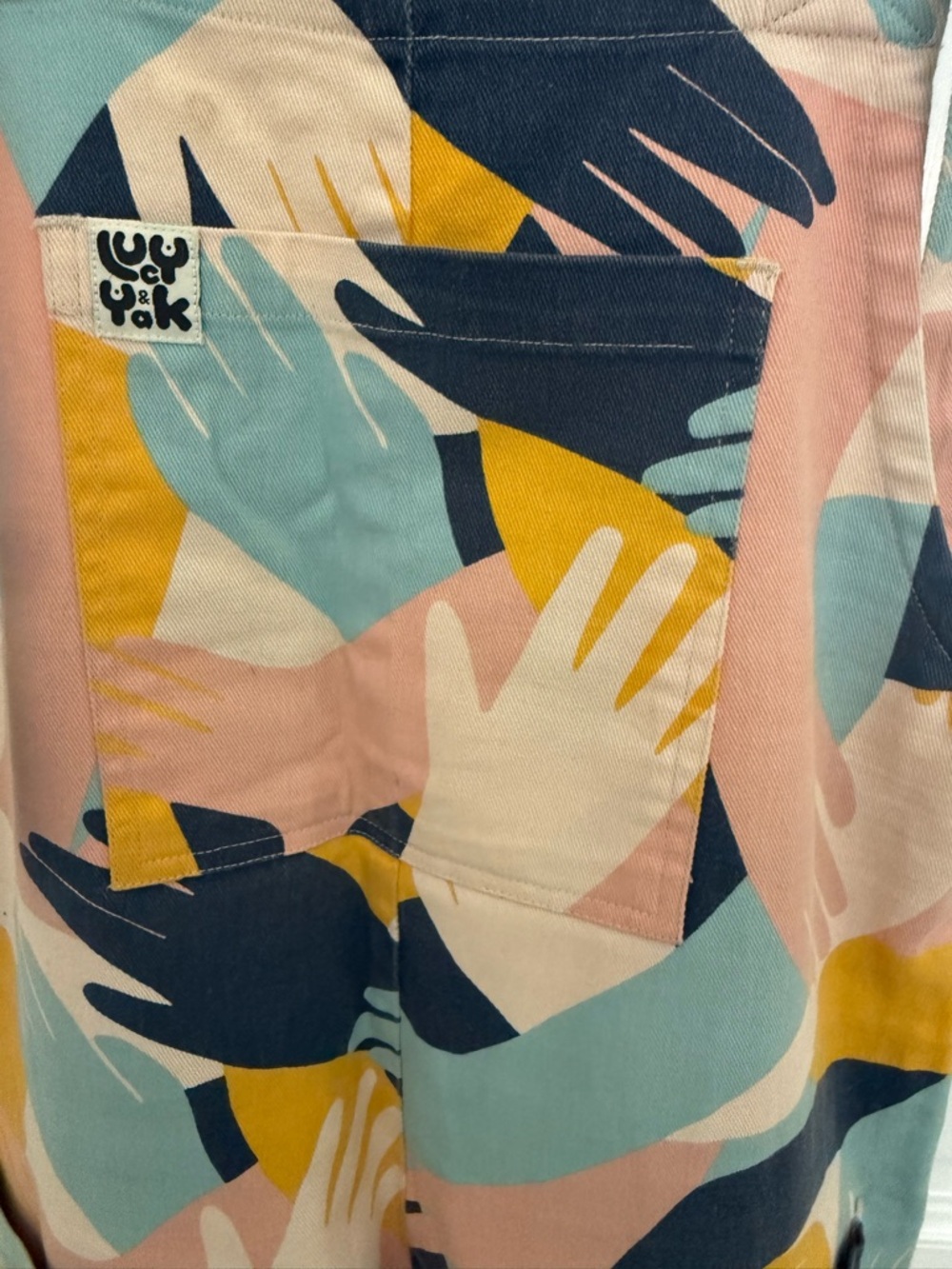 Lucy & Yak Pastel Handprint Utility Dungarees in Pink, Blue & Yellow - Picture 2 of 7